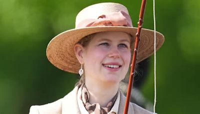 Lady Louise Windsor beams as she arrives at the Royal Windsor Horse Show in a carriage alongside her mother, the Duchess of Edinburgh