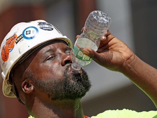 Experts warn of deadly 'wet-bulb' temps in searing heat wave. What those are.