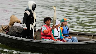 Opening Ceremony: Who is the hooded character with the Olympic torch?