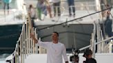 Torchbearers in Marseille kick off the Olympic flame's journey across France