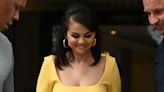 Selena Gomez Embraces Fans in Yellow Dress and Strappy Heels When Leaving London Hotel