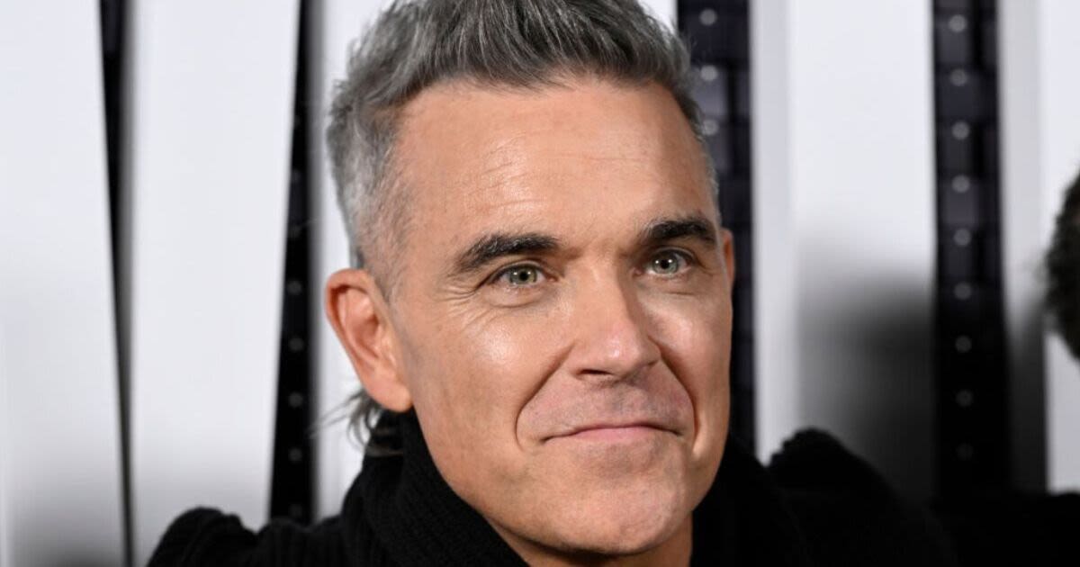 Robbie Williams 'beating himself up' after awkward 'rude' encounter with Cher