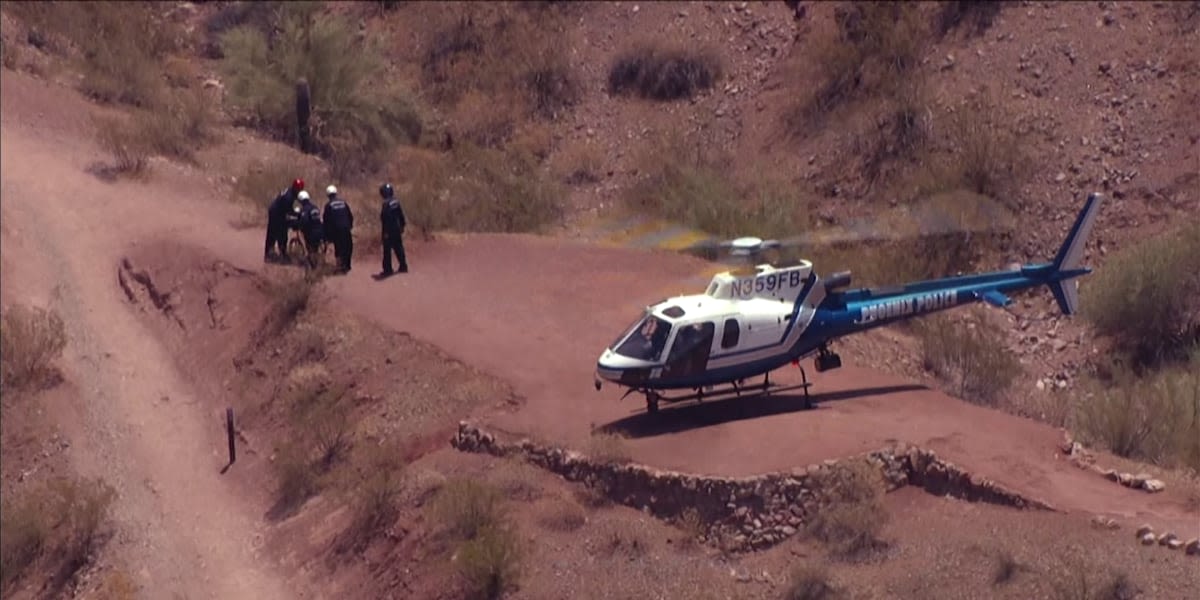 How has the record Phoenix heat impacted mountain rescues?