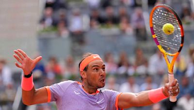 Nadal tested in a 3-hour win over Cachin at Madrid. Swiatek reaches the women's quarterfinals