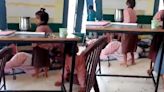 Uttar Pradesh teacher sleeps in classroom as primary school girls fan her: Viral Video | Today News