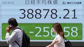 Stock market today: Asian shares are mostly lower ahead of Fed decision on interest rates