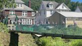 Why is Hooversville's 'swinging bridge' now closed?