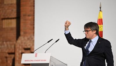 Catalan separatist leader Puigdemont appears at Barcelona event despite arrest warrant