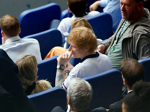 Soccer-Sheeran performs for England players after Slovakia win