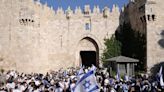 Israeli nationalists march through East Jerusalem, attack reporters