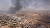 Drone footage shows plane burning at Sudan’s Khartoum airport as fighting continues