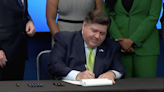 Pritzker signs $53.1B budget, touts investments in education, economic development