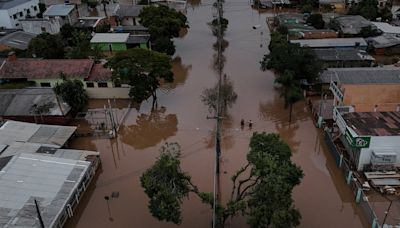 Flood-battered farmers in southern Brazil wade through lost harvests