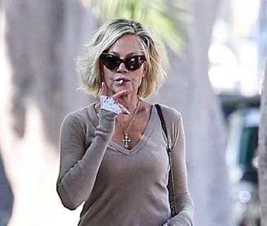 Melanie Griffith puffs on cigarette as she steps out on LA outing