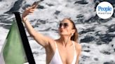 Jennifer Lopez Snaps Selfies and Poses on Bow of a Boat in Italy During Solo Summer Vacation