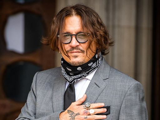 Johnny Depp pays respect to late 'Pirates of the Caribbean' actor Tamayo Perry who was killed in shark attack