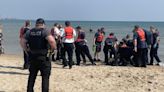 Multiple people rescued from water in Lake Michigan in less than a day, 1 teen dead