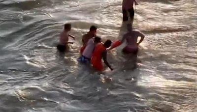 Dramatic video show swimmer rescued in Queens after beaches close