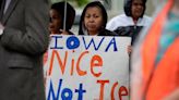 Iowa law allows police to arrest and deport migrants. Civil rights groups are suing