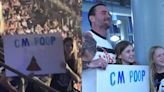 CM Punk Meets Fan With ‘CM Poop’ Sign After WWE RAW