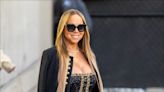 Mariah Carey Works Out in Heels and a Sparkly Gold Gown, Because of Course She Does