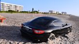 Cocoa Beach police arrest driver of Maserati found trapped in sand