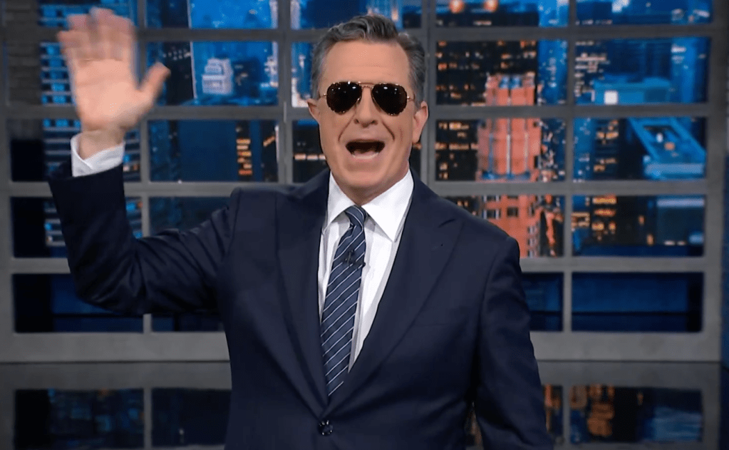 ‘The Late Show’s Stephen Colbert Thanks President Biden For Exiting Presidential Race By Retiring His Aviators