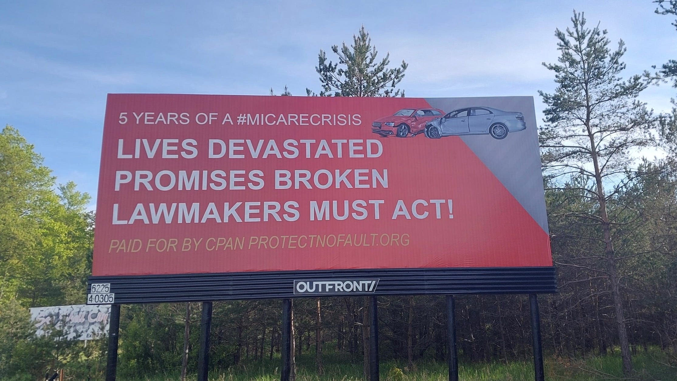 Insider: Billboard blasting 5 years of auto insurance reform to greet Mackinac guests