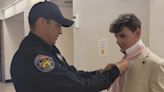 Picture perfect! Pueblo County deputy helps teen tie his tie for prom