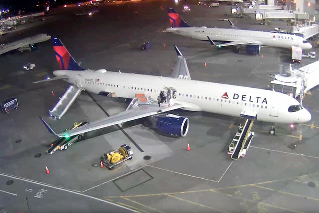 Delta Plane’s Nose Bursts Into Flames After Landing as Passengers Rush to Evacuate via Wings and Slide: WATCH