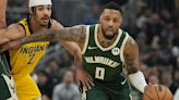 Damian Lillard's 35-point 1st half helps Bucks beat Pacers 109-94 without Giannis in playoff opener