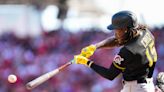 Cruz HR, drives in lead run, Pirates top Reds on opening day