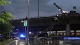 18-wheeler hangs over downtown Dallas bridge after crash, officials say