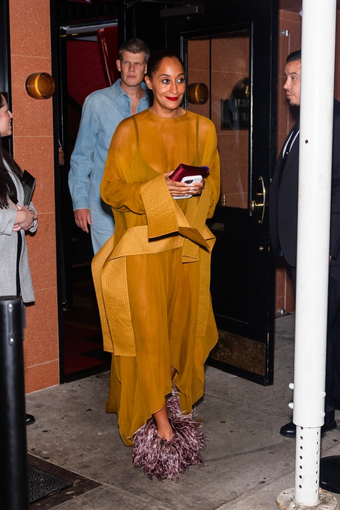 Tracee Ellis Ross Serves Up Camp in Purple Ferragamo Feather Pumps at a Harper’s Bazaar Cocktail Party in New York