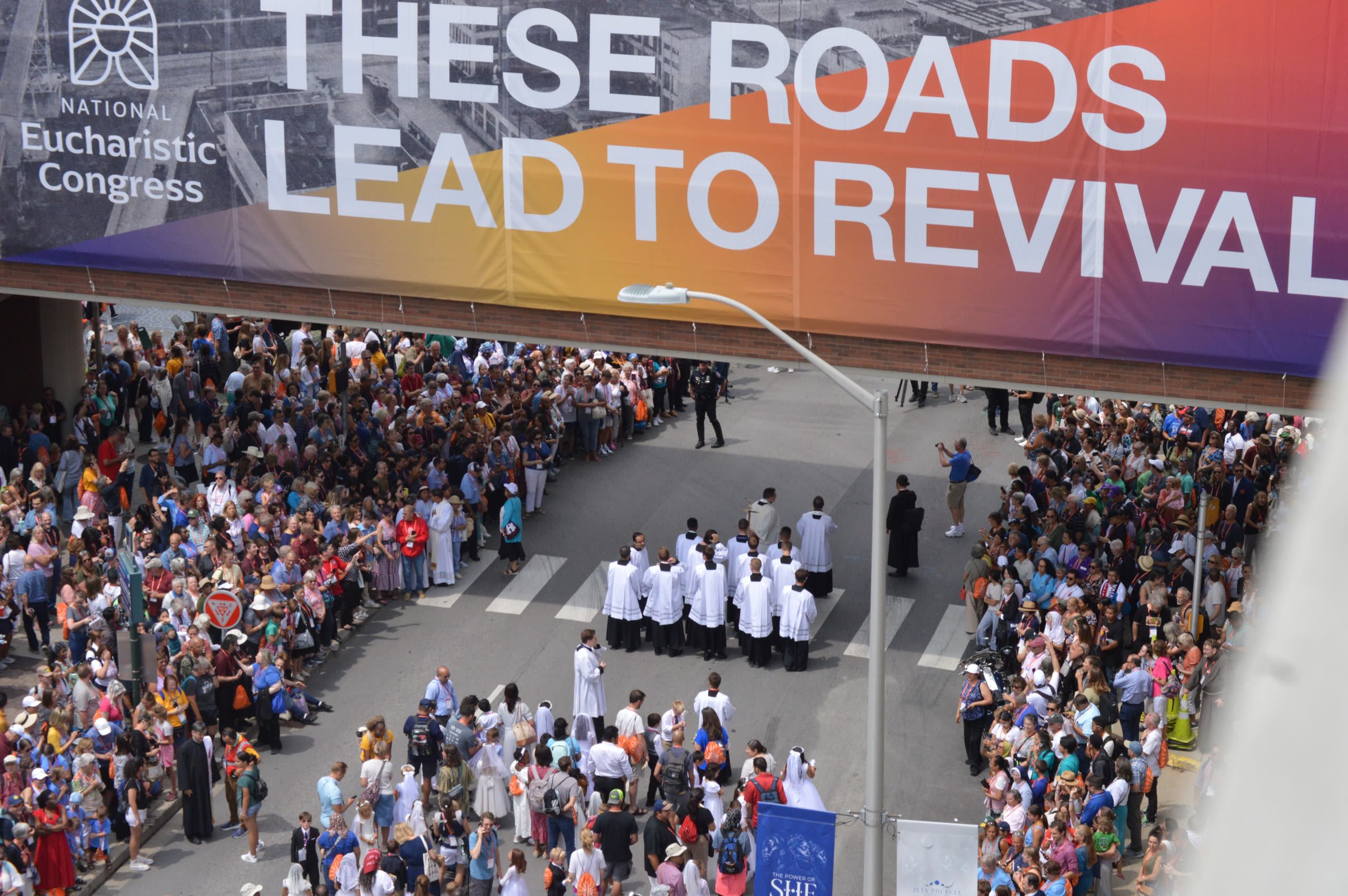 Tens of thousands of Catholics walk through downtown Indy in spiritual procession - Indianapolis Business Journal