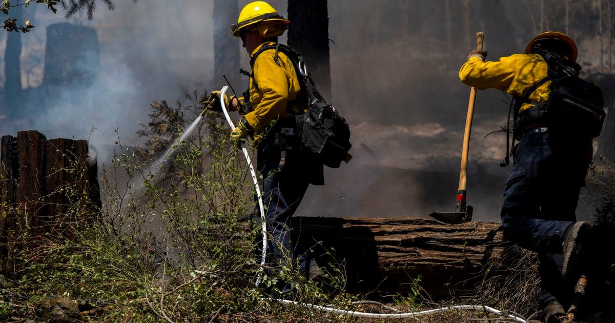 Firefighters make progress against massive blaze in California ahead of warming weather