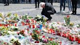 German president pays respects to slain officer stabbed in Mannheim