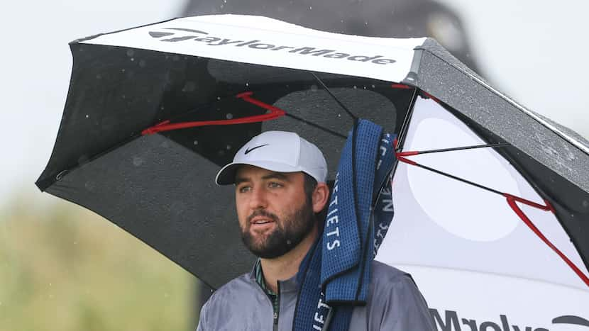 Scottie Scheffler battling for British Open’s top spot after wild day of rain, big numbers