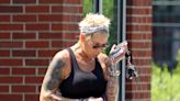 Kim Mathers seen with facial injury as she runs errands after Eminem album nod