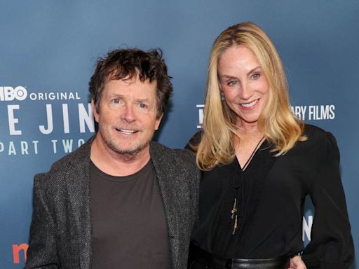 Michael J. Fox Totally Enamored by Wife Tracy Pollan’s Red Carpet Look in New Photos