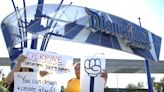 Hundreds of Disneyland workers rally in front of park ahead of strike vote