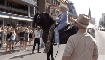 Tanya Tucker Rides Her Horse Down Broadway To Celebrate Opening Of New Nashville Pop-Up Bar