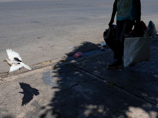 Haiti’s transitional council names a new prime minister in the hopes of quelling stifling violence