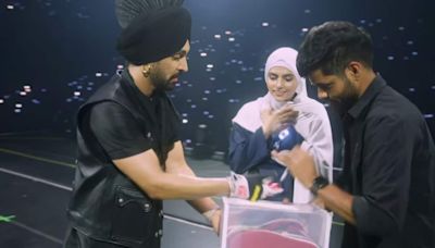 Diljit Dosanjh gifts a pair of shoes to a Pakistani fan at Manchester concert; says, 'Borders are made by politicians'