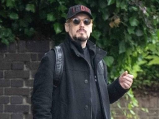 Boy George reveals mystery hand injury as he steps out in bandages