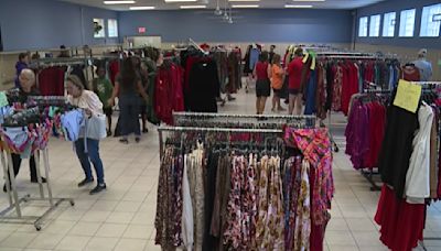 Local charity holds giveaway with clothes donated from Dillard’s store closing