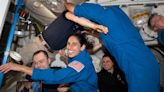 Marine test pilot settles into International Space Station