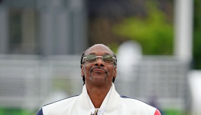 Snoop Dogg gets his black belt, and judo move named after him, at Paris Olympics