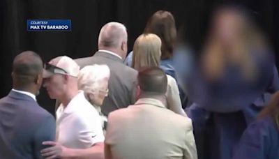 Man charged for pushing superintendent off-stage at Wisconsin high school graduation