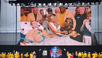 Steve 'Mongo' McMichael, who has ALS, enters the Pro Football Hall of Fame in ceremony at his home